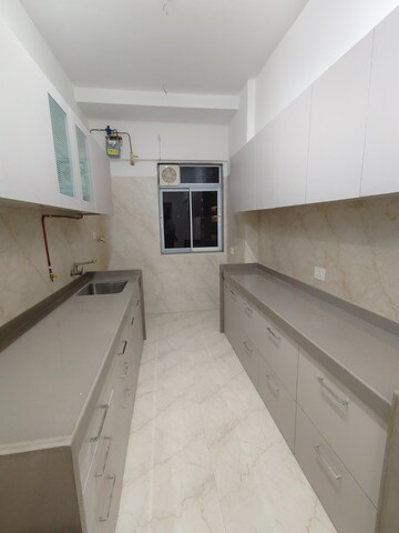 Kitchen in 2.5 BHK Apartment at Prime CHS, Mulund East – for Rent