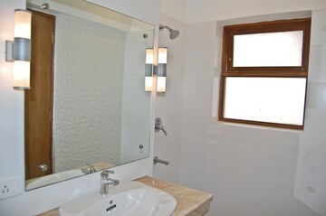 Bathroom in 3 BHK Apartment at Jor Bagh – for Rent
