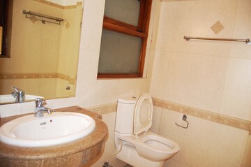 Bathroom in 3 BHK Apartment at Jor Bagh – for Rent