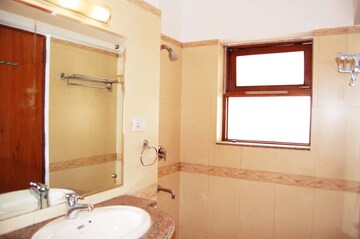 Bathroom in 3 BHK Apartment at Jor Bagh – for Rent