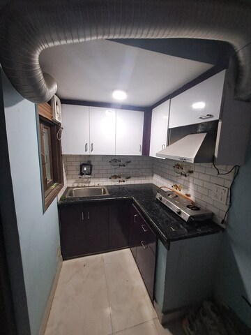 Kitchen in 1 BHK Builder Floor at Chattarpur – for Sale