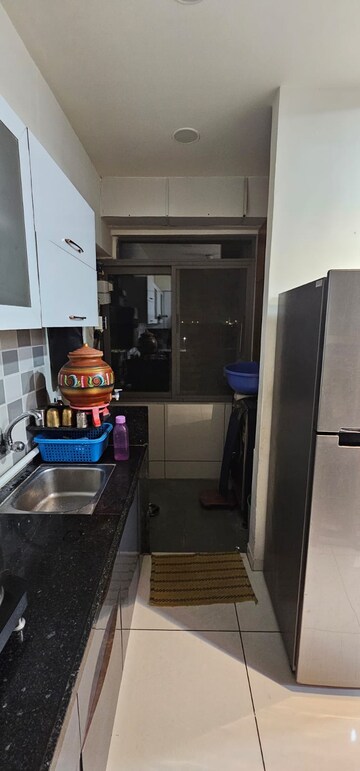 Kitchen in 3 BHK Apartment at Sahaj Solarium, Vasna – for Rent