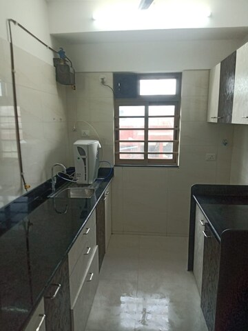 Kitchen in 2 BHK Apartment at Sheth Vasant Oasis, Andheri East – for Rent