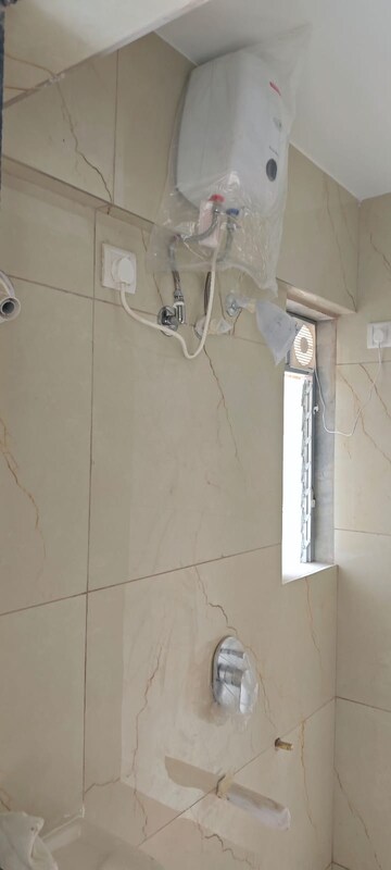 Bathroom in 1 BHK Apartment at Raunak Heights, Ghodbunder Road – for Rent
