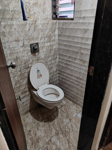 Bathroom in 1 BHK Apartment at Raunak Heights, Ghodbunder Road – for Rent