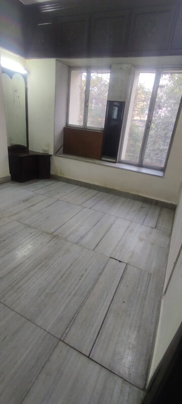 Bedroom in 1 BHK Apartment at Crystal Palace CHS, Malad West – for Rent