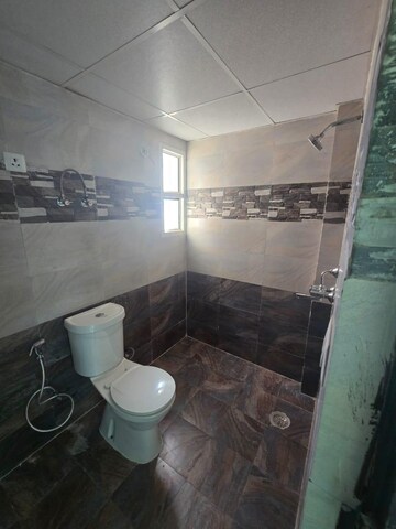 Bathroom in 3 BHK Apartment at JKG Palm Court, Sector 16c Greater Noida – for Rent