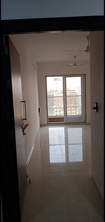 Living Room in 1 BHK Apartment at Ashar Axis, Majiwada – for Rent