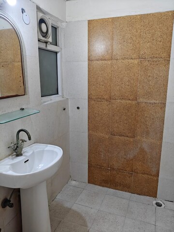Bathroom in 2 BHK Apartment at Antriksh Golf View, Sector 78 – for Rent