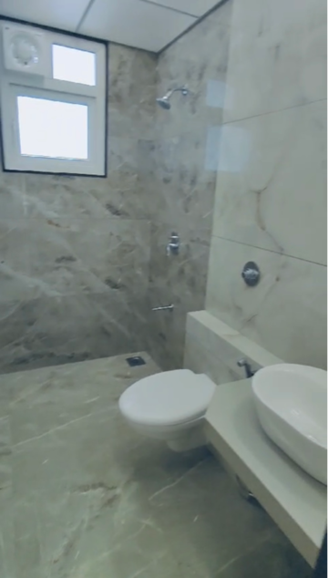 Bathroom in 4 BHK Apartment at Kohinoor Woodshire, Bhugaon – for Sale