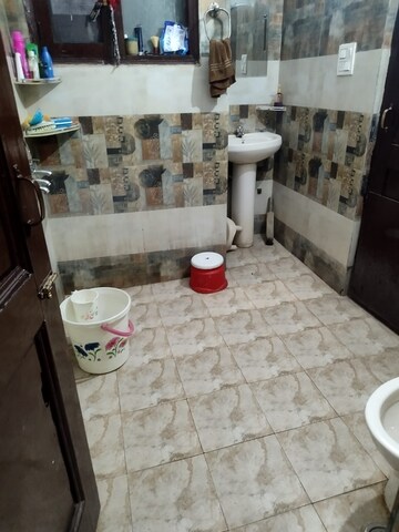 Bathroom in 3 BHK Apartment at Dhakoli Village – for Sale