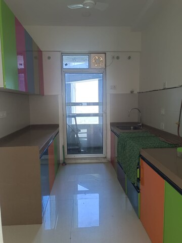 Kitchen in 2 BHK Apartment at Omkar Alta Monte, Malad East – for Rent