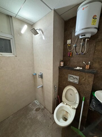 Bathroom in 2 BHK Penthouse at Paradigm Business Hermitage Park, Dhakoli Village – for Rent
