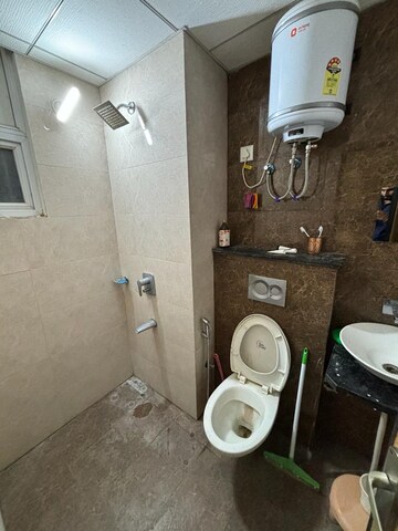 Bathroom in 2 BHK Penthouse at Paradigm Business Hermitage Park, Dhakoli Village – for Rent