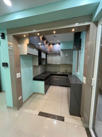 Kitchen in 2 BHK Apartment at Tata Value Homes, Sector 150 – for Rent