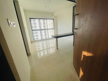 Living Room in 1 BHK Apartment at Lodha Quality Home Tower 2, Majiwada – for Rent