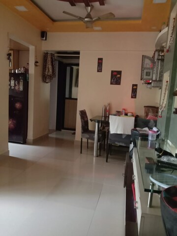 Living Room in 1 BHK Apartment at Kopar Khairane – for Sale