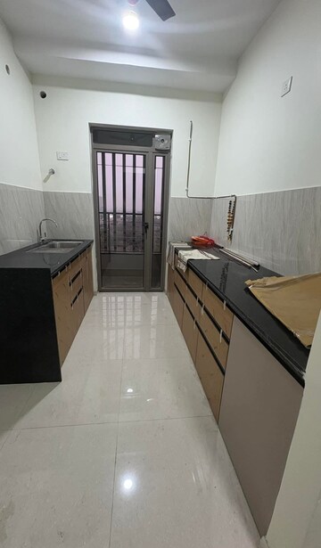 Kitchen in 2 BHK Apartment at Kalpataru Paramount, Kapur Bawdi – for Rent