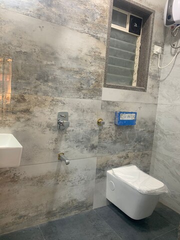 Bathroom in 2 BHK Apartment at Mangeshi City I, Kalyan West – for Sale