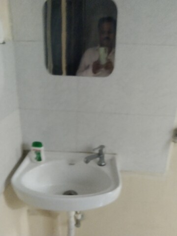 Bathroom in 1 BHK Apartment at Nisarg CHS, Gokhalenagar – for Rent