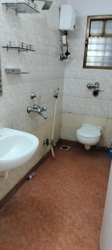 Bathroom in 2 BHK Apartment at Silver Arch Eden woods, Andheri West – for Rent