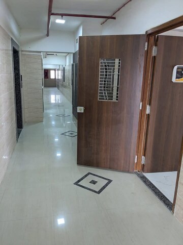 Building Lobby in 1 BHK Apartment at Agarwal Sky Heights, Vasai East – for Sale
