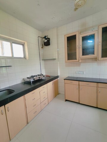 Kitchen in 1 BHK Apartment at Triveni Vasant Vihar CHS, Vasant Vihar – for Rent