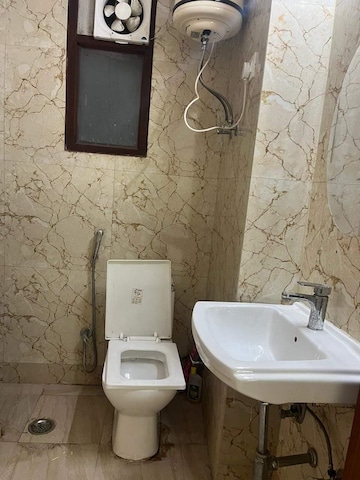 Bathroom in 3 BHK Builder Floor at Freedom Fighters Enclave – for Rent