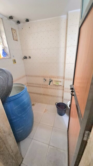 Bathroom in 1.5 BHK Apartment at Sai Sankul Annexe, Kalyan West – for Rent
