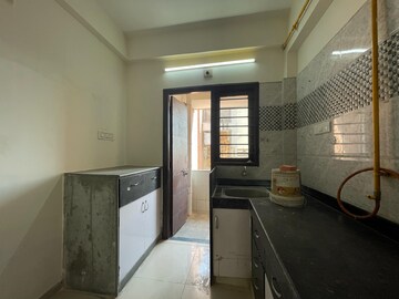 Kitchen in 2 BHK Apartment at Sambhav Stavan Parishray, Gota – for Rent