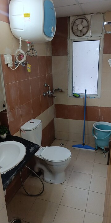 Bathroom in 3 BHK Apartment at Mahagun Mywoods II, Sector 16c Greater Noida – for Rent