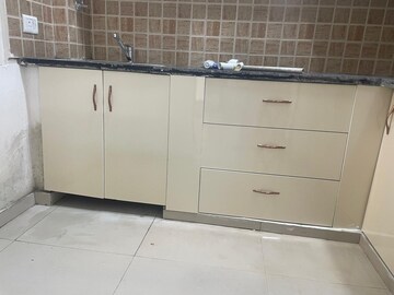 Kitchen in 3 BHK Apartment at Mahagun Mywoods II, Sector 16c Greater Noida – for Rent