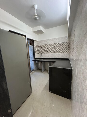 Kitchen in 2 BHK Apartment at Shree Sai Surya Kiran, Andheri West – for Rent