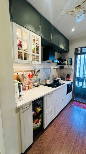 Kitchen in 2 BHK Apartment at Kalpataru Paramount, Kapur Bawdi – for Sale