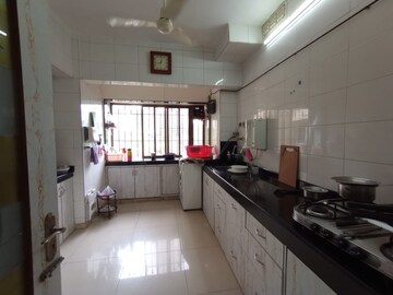 Kitchen in 4 BHK Apartment at Happy Valley, Manpada – for Sale