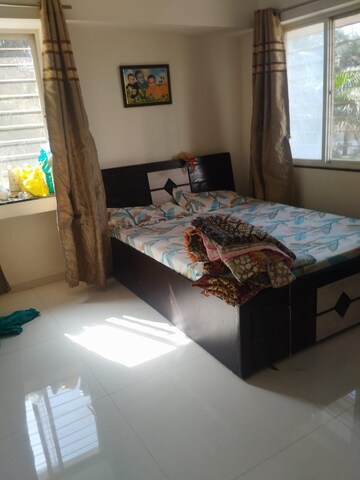 Bedroom in 3 BHK Apartment at Kumar Peninsula, Baner – for Rent