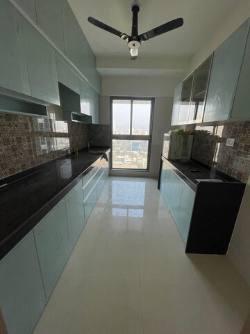 Kitchen in 3 BHK Apartment at Rajesh Raj Infinia, Malad West – for Rent