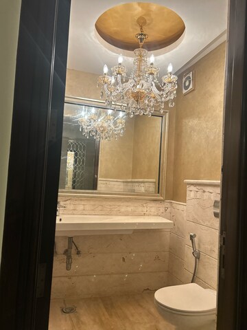 Bathroom in 4 BHK Apartment at DLF The Magnolias, Golf Course Road – for Rent