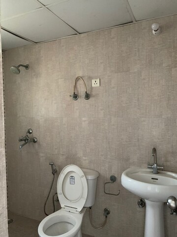 Bathroom in 3 BHK Apartment at Aditya City Apartments, Shahpur Bamheta – for Rent