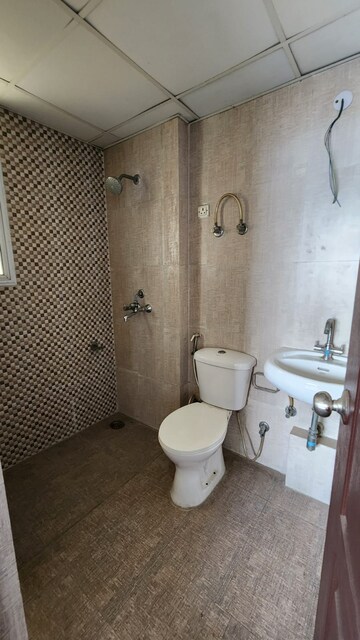 Bathroom in 1 BHK Apartment at Aditya City Apartments, Shahpur Bamheta – for Rent