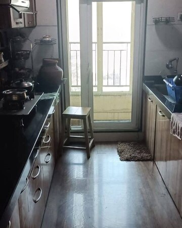 Kitchen in 2 BHK Apartment at Rustomjee Urbania, Majiwada – for Rent
