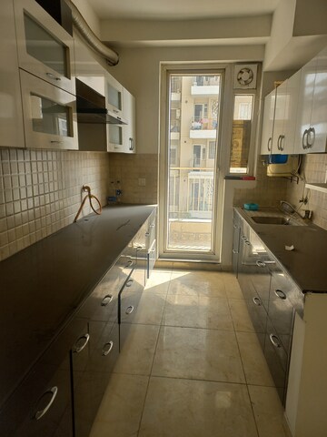 Kitchen in 3 BHK Apartment at BPTP Discovery Park, Sector 80 – for Rent
