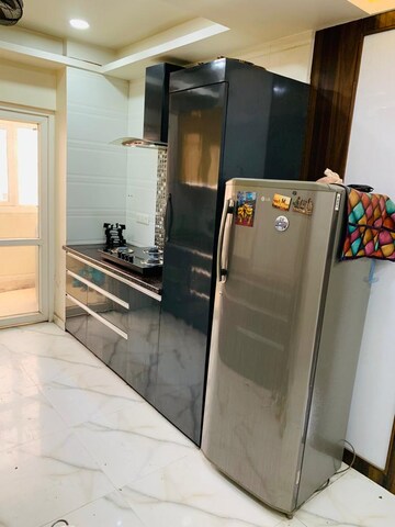 Kitchen in 2 BHK Apartment at Gaur City 2 - 12th Avenue, Sector 16c Greater Noida – for Rent