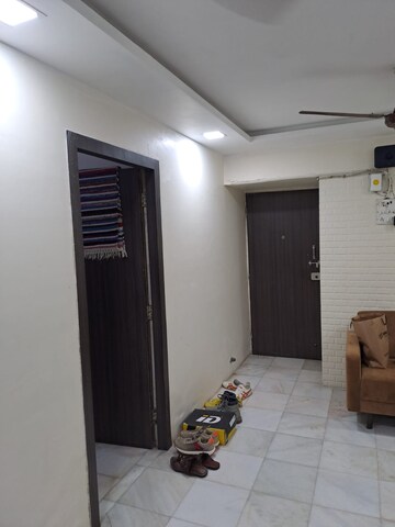 Living Room in 2 BHK Apartment at Shree Akshar Kripa CHS, Andheri West – for Sale