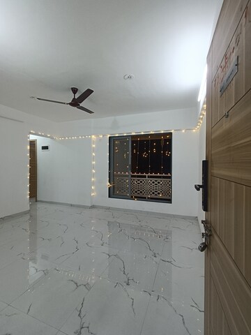 Living Room in 2 BHK Apartment at Lodha Panacea 1, Dombivli East – for Rent