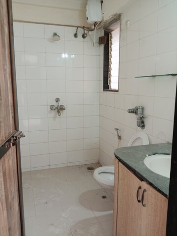 Bathroom in 3 BHK Apartment at Vanashree CHS, Seawoods – for Rent