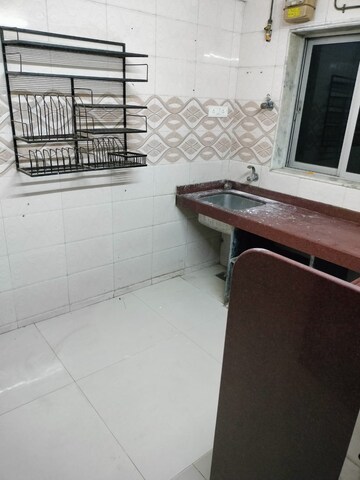Kitchen in 2 BHK Apartment at Navkar Panchavati Greens, Marol – for Rent