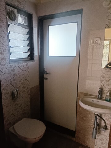 Bathroom in 2 BHK Apartment at Aggarwal Sumeet Elegance, Manpada – for Sale