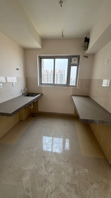 Kitchen in 1 BHK Apartment at Piramal Vaikunth, Balkum Pada – for Sale