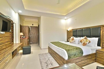 Living Room in 1 BHK Apartment at K Raheja Palm Court, Malad West – for Rent